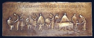 Bronze plaque that hangs in the hospital lobby.