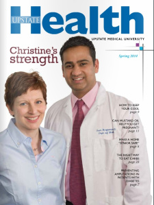 Christine shares the cover of Upstate Health with her oncologist, Dr. Sam Benjamin.