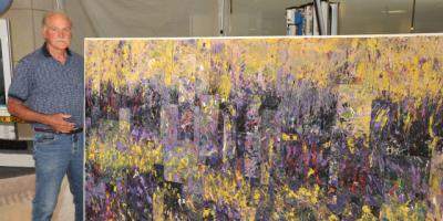 Ridlon wildflower painting hangs in hospital lobby