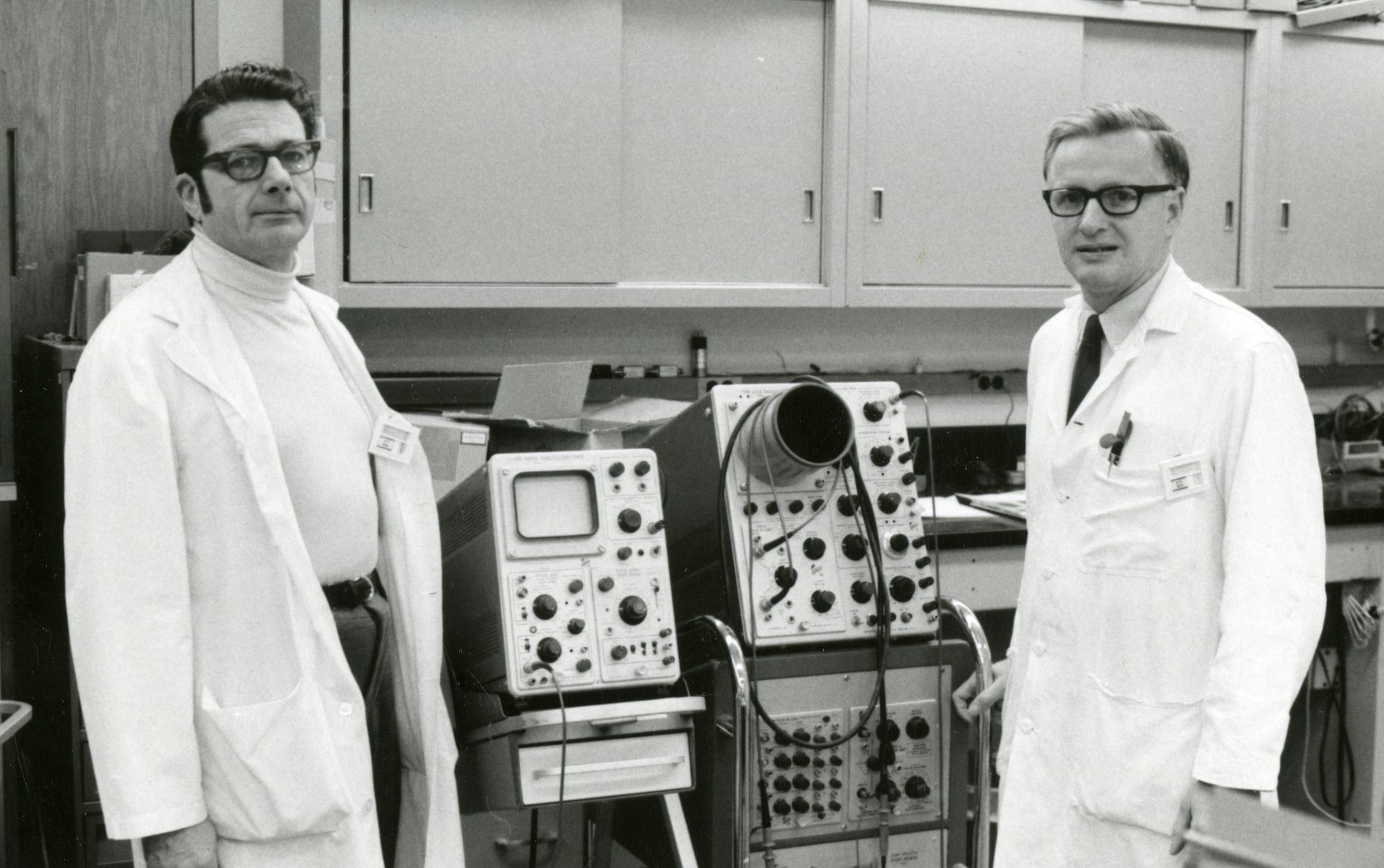 John McAfee MD, chairman of radiology and radiological sciences, 1965-1989, and Robert Richardson PhD, associate professor of radiology, in the nuclear medicine lab at Upstate University Hospital, circa 1970.