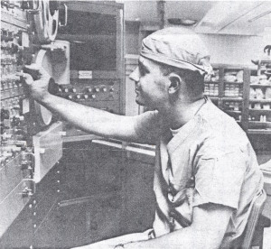 Donell Bacon worked on this electronic console in the operating room. Pictured is his colleague, Larry George. Syracuse Newspapers, 9/5/65.