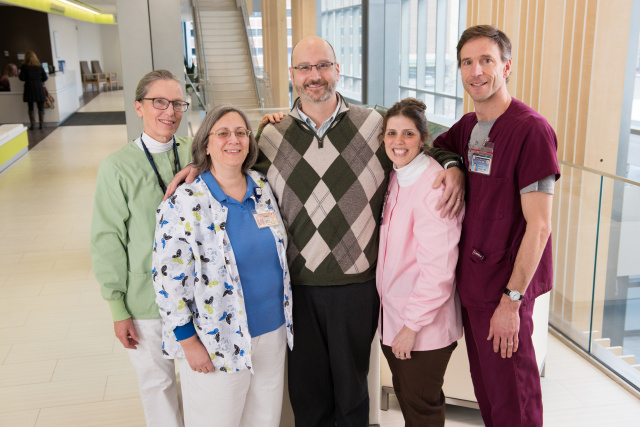 Author David Lankes, PhD, center, with his oncology nurses, from left to right, Carolyn Stafford, Heidi See, Cyndy Carr and Kevin O'Keefe.