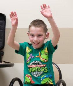 Mason Drake at the moment he heard sound, thanks to cochlear implants. Photo by Kathleen Paice Froio.