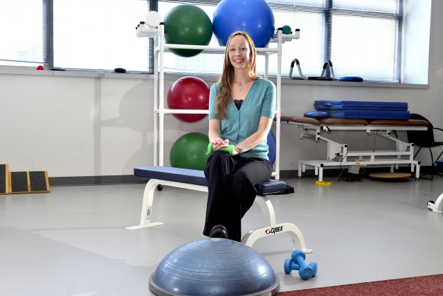 Cassi Terpening, DPT, in the therapy gym at Upstate's Institute for Human Performance. Some appointments may be held at the Upstate Cancer Center. (PHOTO BY WILLIAM MUELLER)