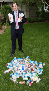 Laurence Segal shows receipts from the bottles and cans he has redeemed to help cancer research. (PHOT OBY SUSAN KAHN)