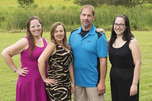 David Hoistion, 46, weighs 185 pounds, down from 345 pounds before his surgery in April 2012. His wife, Tanya Hoistion (second from left) had surgery in October 2012, dropping to 140 pounds from 265 pounds. His two daughters had surgery on the same day in October 2014. Nicole Hoistion, 25, (left) has dropped to 210 pounds from 325, and Cherica, 20, (right) has dropped to 170 pounds from 272 pounds.