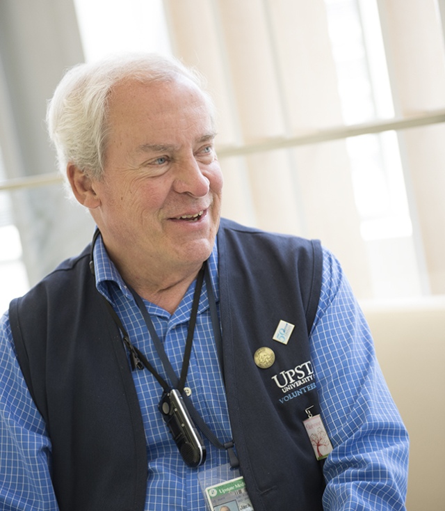 Jack Edgerton, a volunteer at the Upstate Cancer Center, is also a cancer survivor, which allows him to sympathize and emphasize, he says. (PHOTO BY SUSAN KAHN)