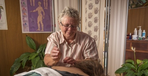 Agne's father and brother both died of esophageal cancer, and she learned about cancer survival from some of her massage therapy clients. (PHOTO BY ROBERT MESCAVAGE)