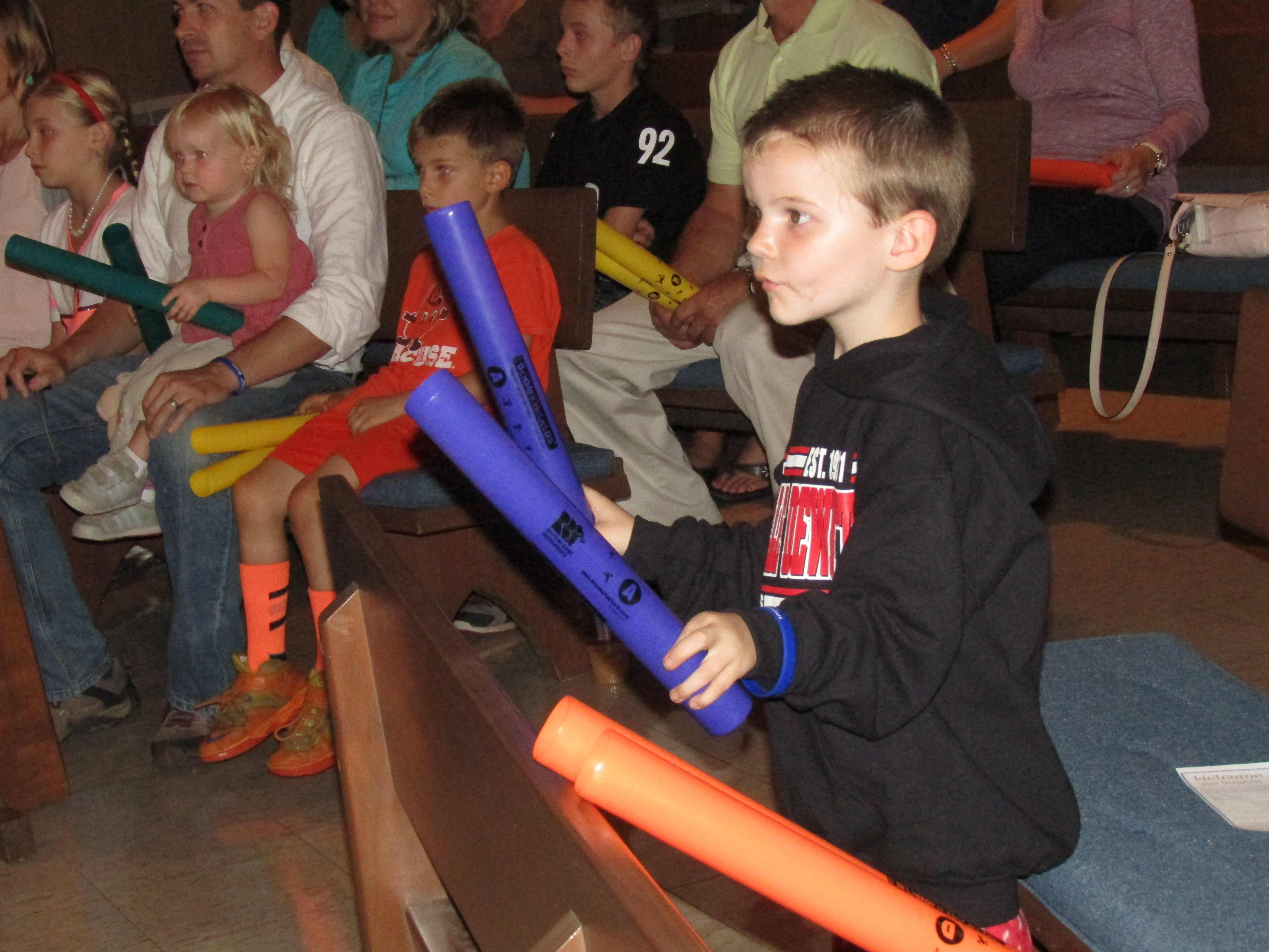 Zachary Cottell, 4, responds to a musical prompt, or rhythm seed, by drumming with purple plastic tubes (boom whackers) at an interactive concert for people affected by autism. The concert was part of a two-day autism awareness event hosted by Upstate‘s Margaret L. Williams Developmental Evaluation Center.