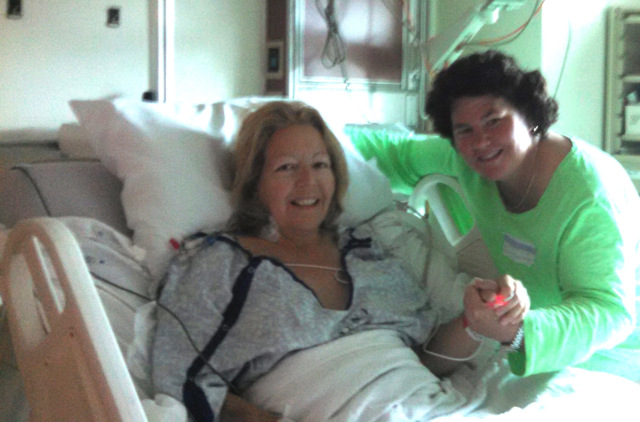 Michelle Mastropolo recovers from her kidney transplant in August 2014 with the support of her spouse, Carol Ann Davies.