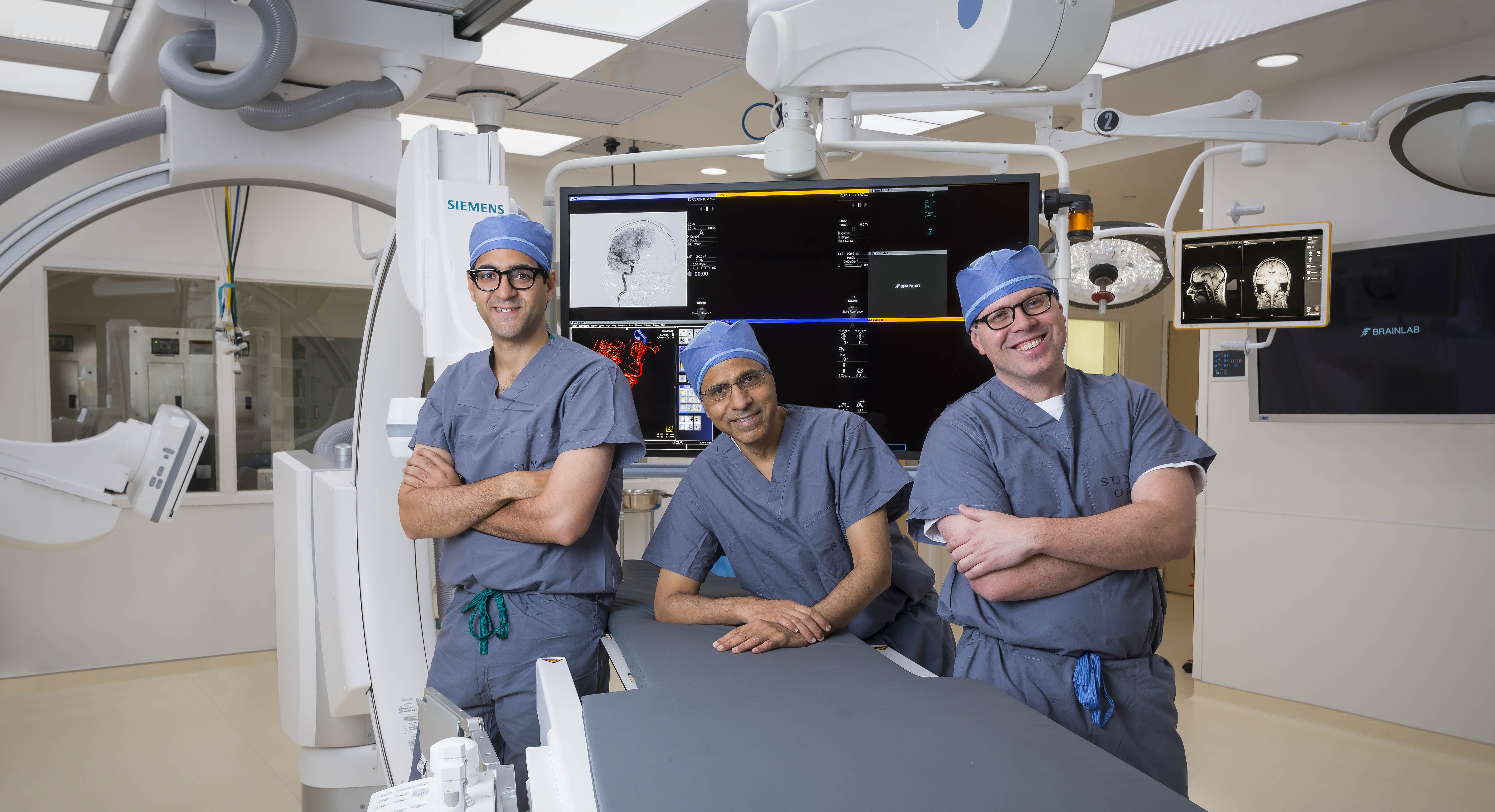 (From left) Hesham Masoud, MBBCh, Amar Swarnkar, MD, and Grahame Gould, MD, are colleagues at Upstate. (PHOTO BY ROBERT MESCAVAGE)