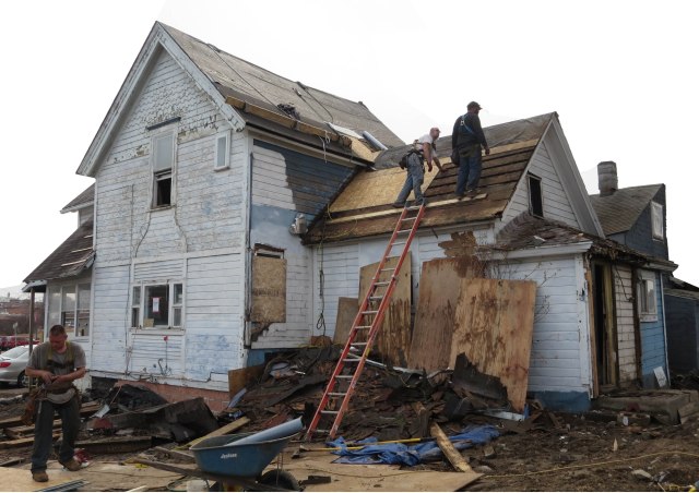 The house at 142 Granger St., Syracuse, near the Rescue Mission, as it looked while undergoing renovations. (PHOTO BY Jim McKEEVER)