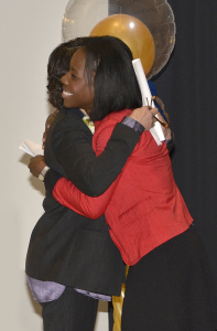 Upstate President Danielle Laraque-Arena, MD, hugs Kethia