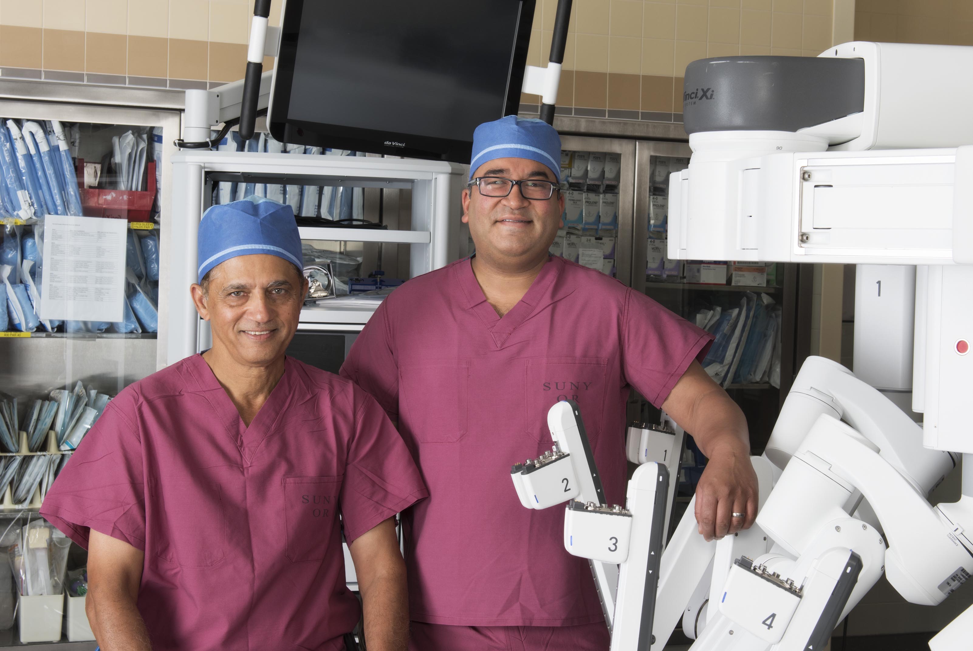 Upstate hepatobiliary surgeons Dilip Kittur, MD (left), and Ajay Jain, MD. (PHOTO BY SUSAN KAHN)