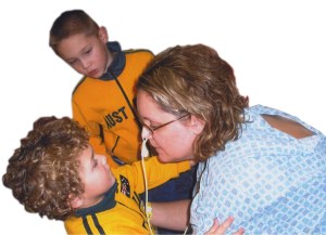 Carroll's sons visit her in the hospital, shortly after her 2009 stroke.