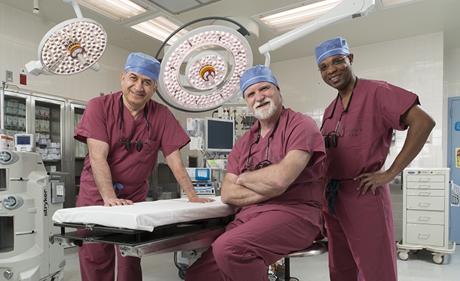 Members of the transplant surgical team include, from left, Mark Laftavi, MD, Rainer Gruessner, MD, chief of transplant services, and Vaughn Whittaker, MD. (PHOTO BY ROBERT MESCAVAGE)