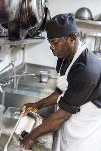 Person washing dishes