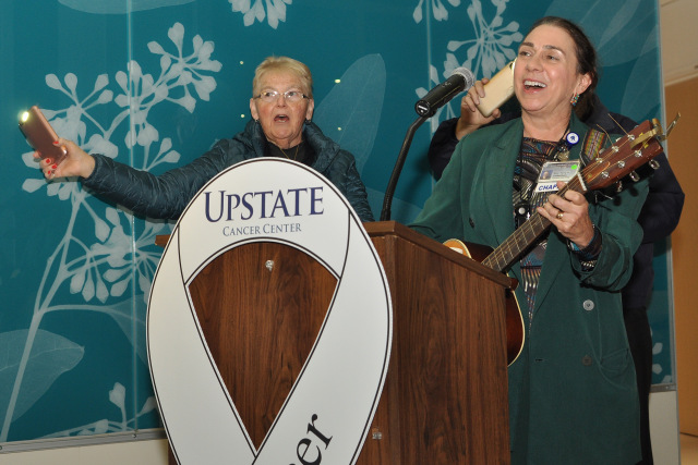 Rev. Terry Culbertson, director of Spiritual Care at Upstate, sang during the vigil and shared a poem: Faith is the bird that feels the light and still sings when the dawn is dark.