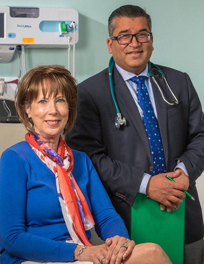 Gail Brehm with her surgeon, Ajay Jain, MD, associate chief of liver and pancreatic surgery at Upstate. Her coordinated plan showed good results. (PHOTO BY ROBERT MESCAVAGE)