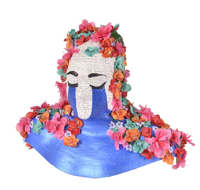 Mask sculpture by Amina GIngold. (PHOTO BY WILLIAM MUELLER)