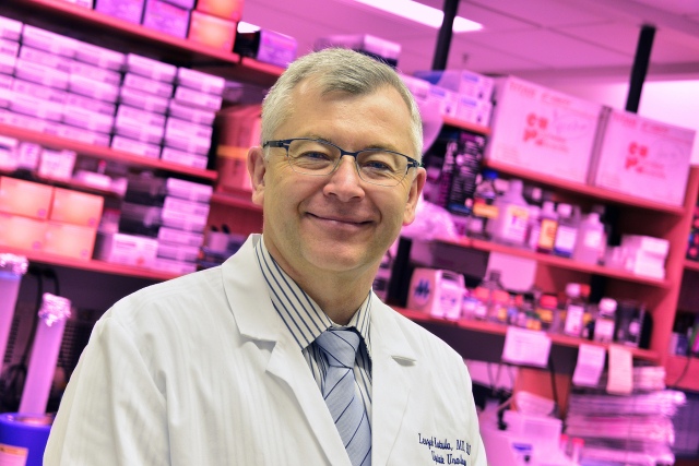 Leszek Kotula, MD, PhD, in his lab. He is one of Upstate's researchers who seeks to benefit cancer patients with advancements in diagnostic and treatment options (PHOTO BY WILLIAM MUELLER)