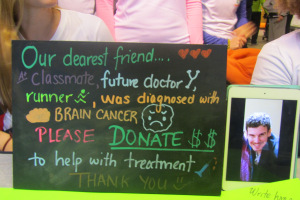A sign and photo of medical student Alex Paley was on display at the Feb. 5 run.