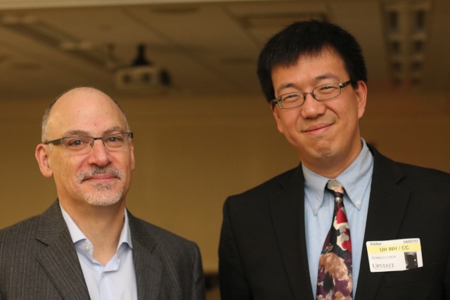 Upstate Cancer Center interim director Jeffrey Bogart, MD, left, and Ronald Chen, MD, a cancer specialist and researcher from the University of North Carolina at Chapel Hill. Chen spoke at Upstate about screening guidelines for prostate cancer and why they are shifting. (PHOTO BY JIM HOWE)