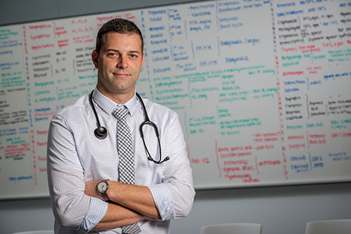 A caregiver, such as nurse practitioner Travis DeBois, above, can be a vital source of information to a patient seeking to learn more about his or her disease. (PHOTO BY ROBERT MESCAVAGE)