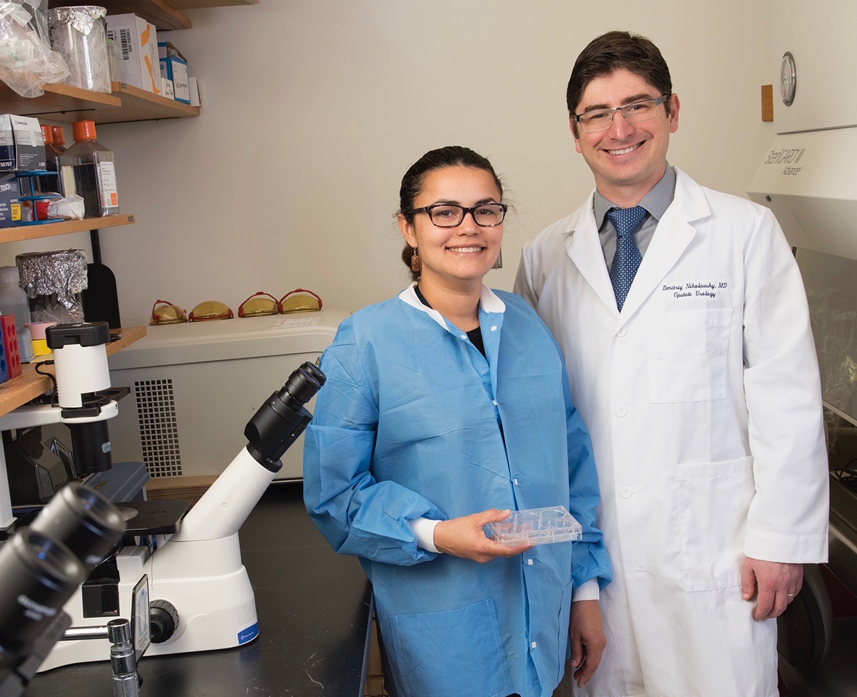 Dmitriy Nikolavsky, MD, is director of reconstructive urology at Upstate University Hospital. He has completed more than 250 urethral reconstructions over the past four years. He is shown with his wife, Daniela Nikolavsky, who works in the urology laboratory. (PHOTO BY SUSAN KAHN)