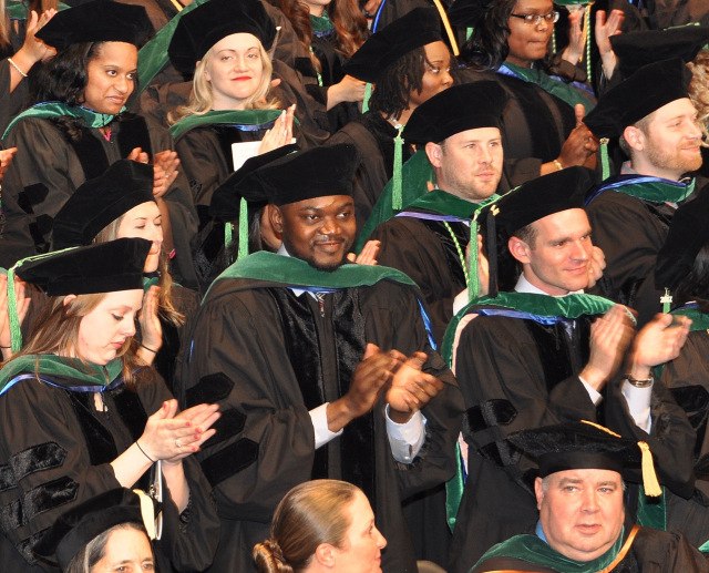 Upstate College of Medicine's Class of 2017 at graduation ceremonies in the John H. Mulroy Civic Center in Syracuse. (PHOTO BY RICHARD WHELSKY)