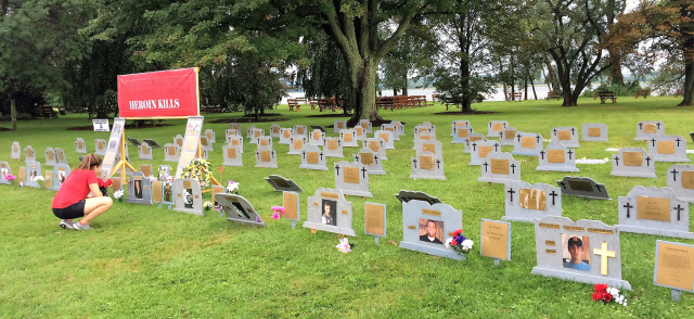 A makeshift cemetery at Onondaga Lake Park was set up in August by a surviving family members who lost someone to a drug overdose. Each tombstone represents someone who died from a drug overdose. (PHOTO BY RICK MORIARTY/SYRACUSE MEDIA GROUP)