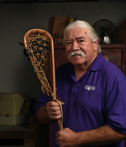 Jacques, shown with a lacrosse stick he created, says he considers himself lucky - to have survived kidney cancer and not to have needed chemotherapy or radiation after his surgery. (PHOTO BY JOHN BERRY)