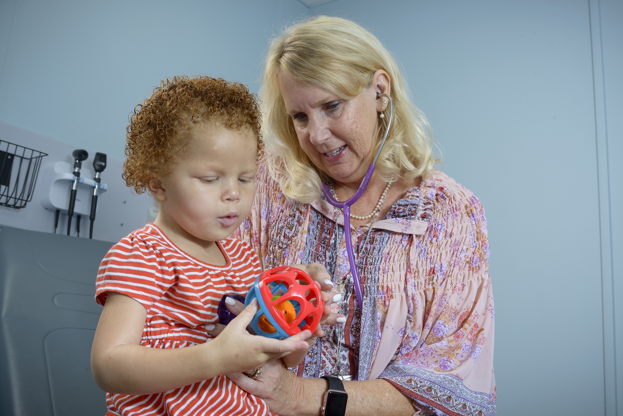 Tracy Cornell with pediatric pulmonary nurse practitioner Mary Foster. (PHOTO BY ROBERT MESCAVAGE)