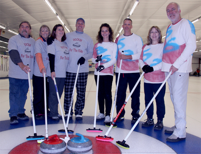 Douglas Rosenthal, far right, of hospital information systems, organized the curling event in Whitesboro to raise money for pediatric services at the Upstate Cancer Center. Other participants included, from left, Steve Susco, Sue Hemingway, Tina Craig, Chris Ousby, Suzan Bzdick, John Bartosek and Susan Rosenthal.