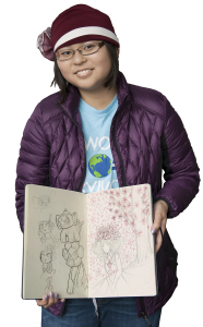 Nguyen shows the sketchbook she was given by a cousin on the day she was diagnosed with lymphoma. (PHOTO BY SUSAN KEETER