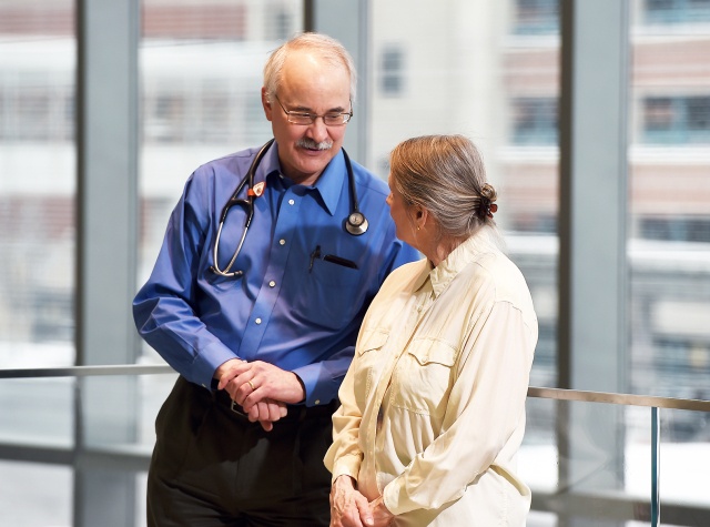 Upstate oncologist Stephen Graziano, MD, talks with his patient, Sandra Floyd. (photos by John Berry)