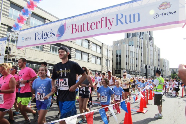 Runners of all ages participate in Paige‘s Butterfly Run to support children with cancer. (photo by Susan Keeter)
