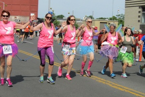 Tutus and butterfly wings were part of the uniform for this YMCA team at Paige's Butterfly Run. (photo by Susan Keeter)