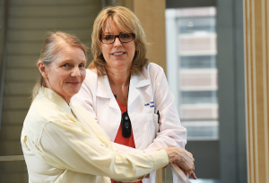 Floyd, left, with Linda Troia, a physician assistant in the palliative care service at the Upstate Cancer Center.