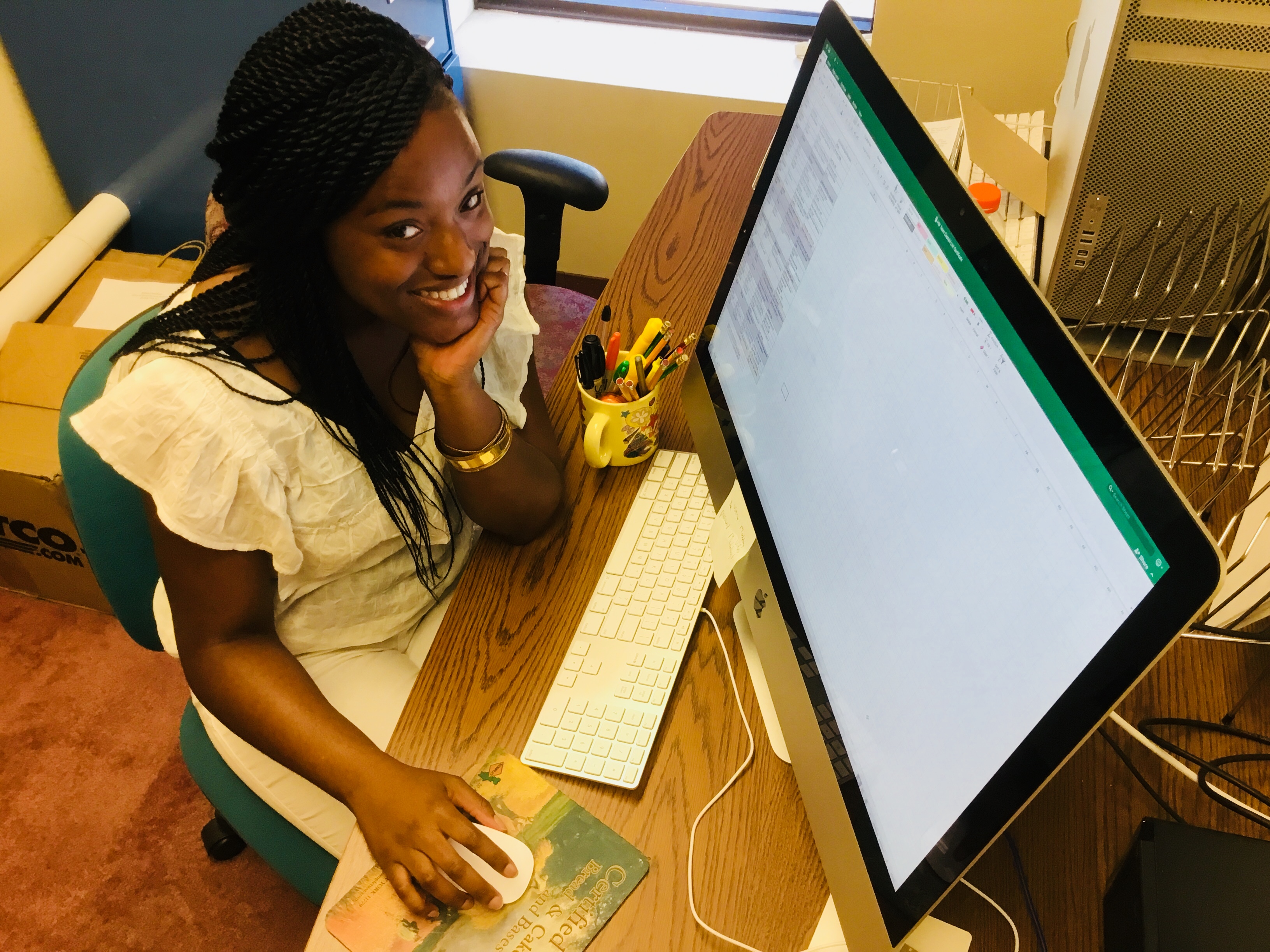 Amani Mike, a student at SUNY College at Brockport, has a summer internship at Upstate Medical University, thanks to a partnership with Synergy. (Photo by Susan Keeter)