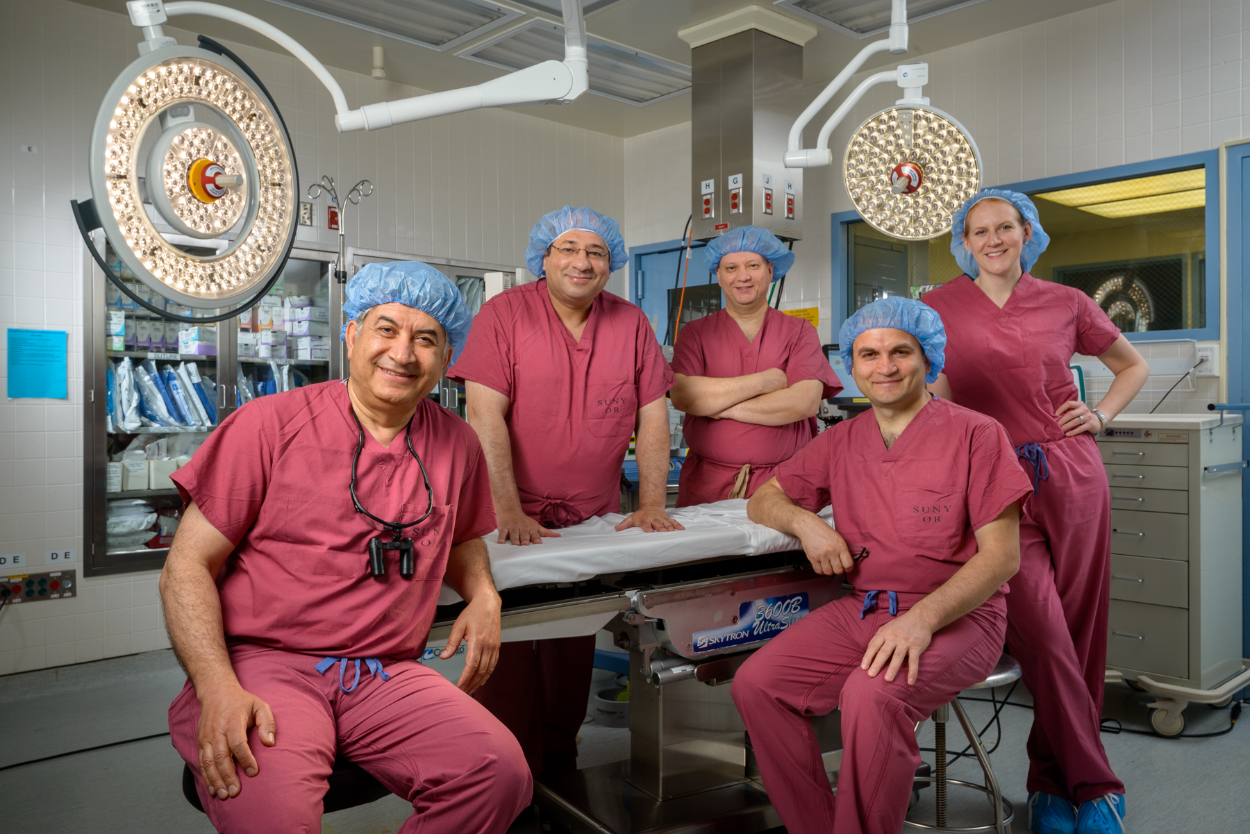 The transplant surgery team, from left: Mark Laftavi, MD, Tamer Malik, MBBCh, Zeki Acun, MD, Rauf Shahbazov, MD, and physician assistant Sharon Denise. (Photo by Robert Mescavage)