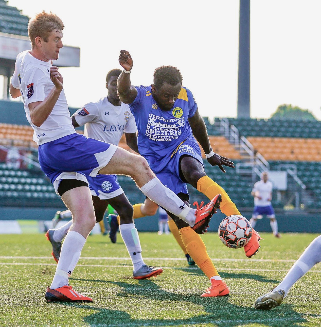 Upstate nurse Isaac Kissi, playing for the Rochester Lancers in the blue jersey, has played soccer both professionally and for fun (photos by Rob Daniels)