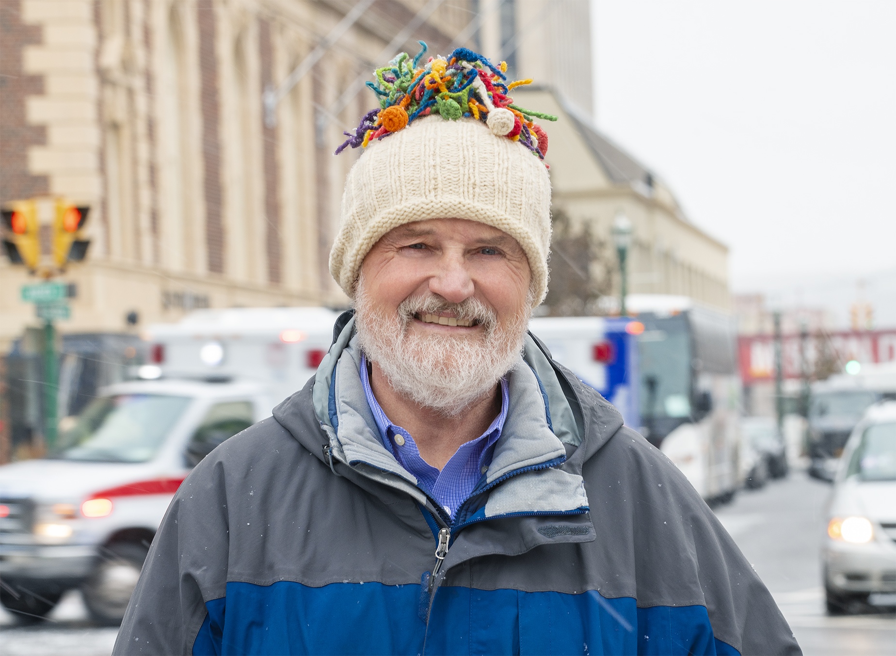 David Lehmann, MD, dispenses medical care to homeless people in Syracuse. He accompanies workers from In My Father's Kitchen, which distributes food and clothing to the needy. (photo by Robert Mescavage)
