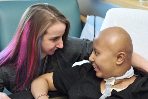 Bradt, shown with Muyan, can tell her young patients, "I've been through this myself."