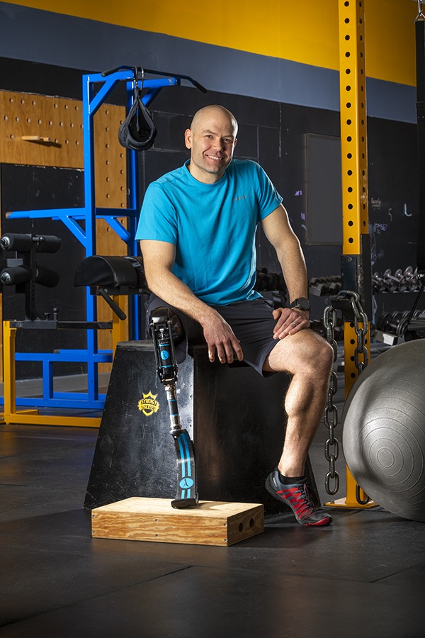 Childhood cancer survivor Dan Kosick of Endicott is shown at Synergy Athletics fitness center, where he trains and works out. (photo by Robert Mescavage)