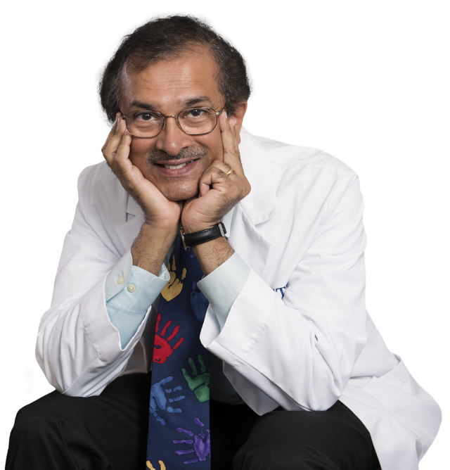 Neurosurgeon Satish Krishnamurthy, MD. He is wearing a necktie from the charitable organization Save the Children in honor of his many pediatric patients. (photo by Susan Kahn)
