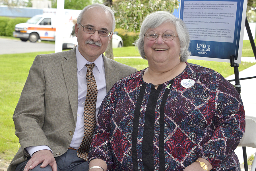 Stephen Graziano, MD, with his patient Kathi Tamer at the 25th anniversary celebration of the Upstate Cancer Center at Oneida. Tamer, who lives in Utica, sees Graziano at the Oneida office every six months. (photo by Richard Whelsky)