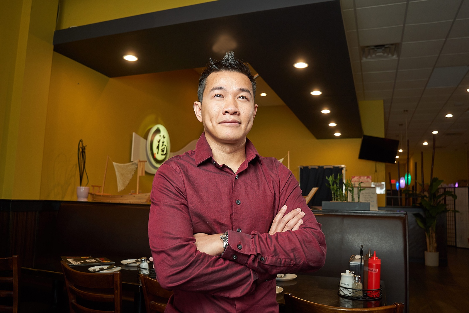 Upstate nurse Thanh Nguyen at the Saigon Vietnamese Kitchen, his restaurant outside Liverpool. (photo by Chuck Wainwright)