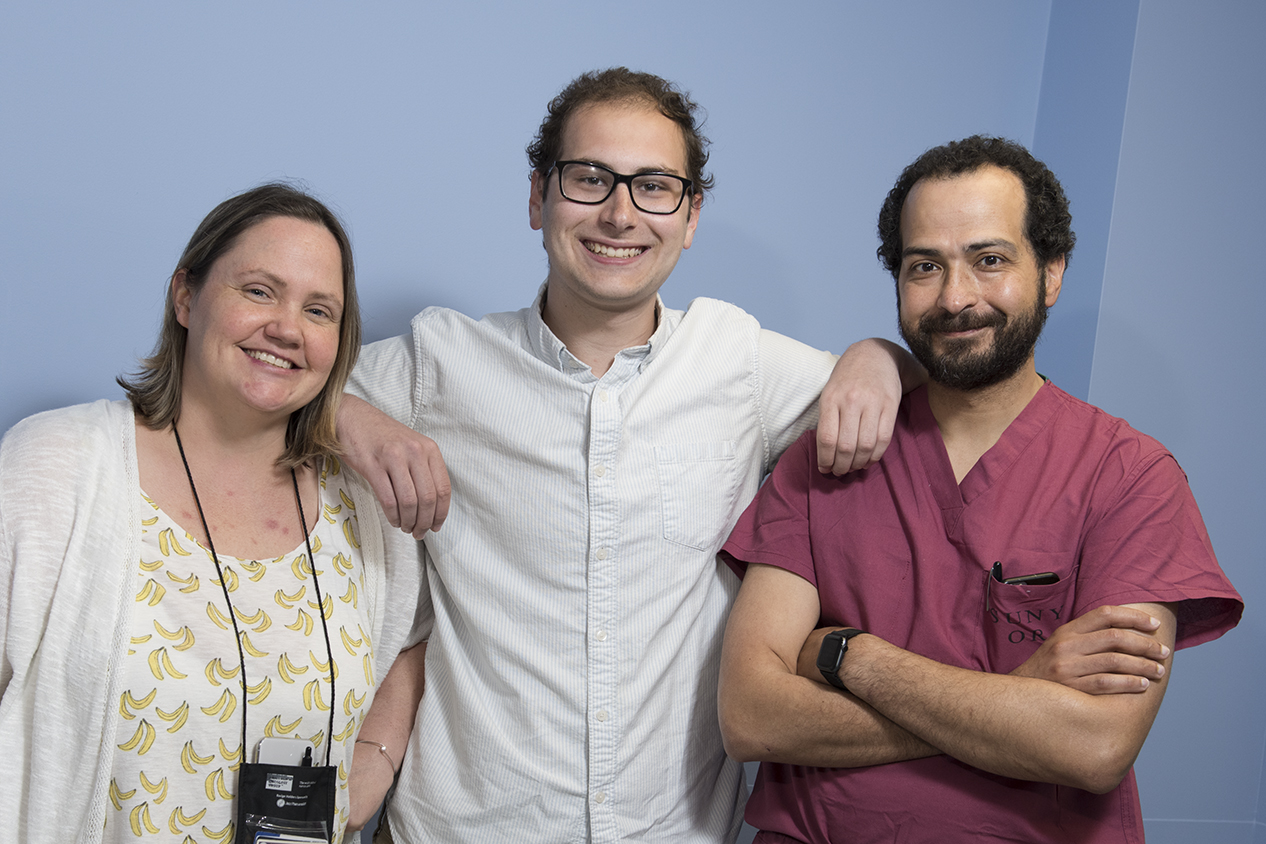 John Hrbac, center, with his pediatric oncologist, Jodi Sima, MD, left, and his surgeon, Tamer Ahmed, MD, right. (photos by Susan Kahn)