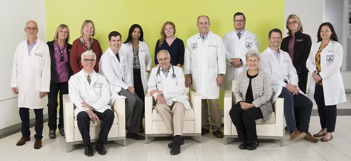 The TOP team includes, from left: Jeffrey Bogart, MD, radiation oncology; Terri Harrington, RN; Carolyn Walczyk, tobacco treatment counselor; Ernest Scalzetti, MD, radiology ; Michael Archer, DO, thoracic surgery; Manju Paul, MD, pulmonology; Stephen Graziano, MD, oncology ; Erin Bingham, clinical research associate; Jason Wallen, MD, thoracic surgery; Mark Crye, MD, thoracic surgery; Leslie Kohman, MD, director emerita ; Michael Mix, MD, radiation oncology ; Heather Smith, RN; and Ginger Cowan, NP.